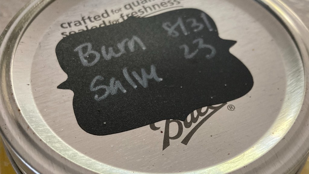 dated burn salve tin label
