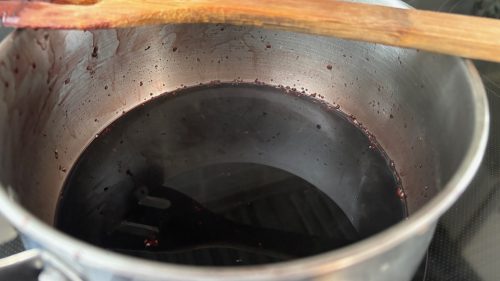a pot with a deep purple liquid in it